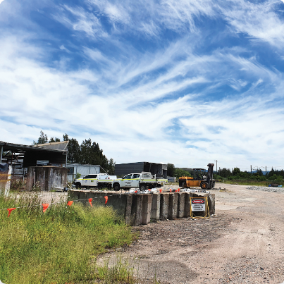 Trucks parked nearby constructions